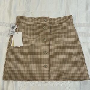 Beige plated fall skirt with tags on NEVER worn.